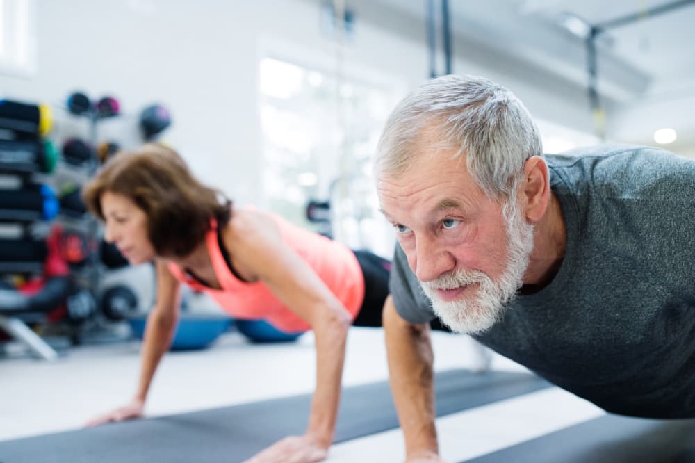 elder couple exercising