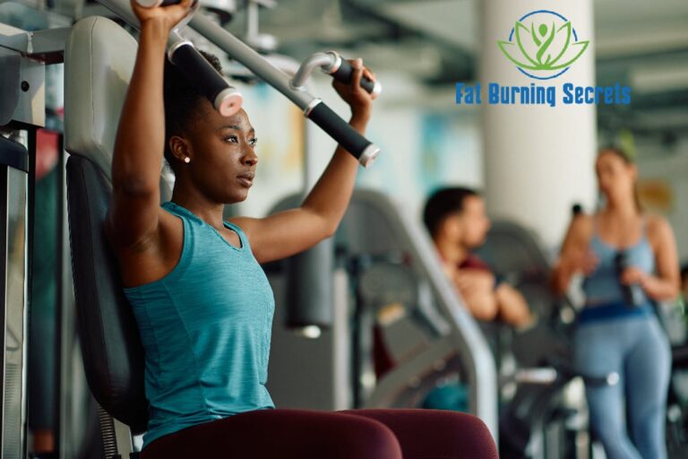 How often should you exercise? Attractive African-American woman exercising in gym.